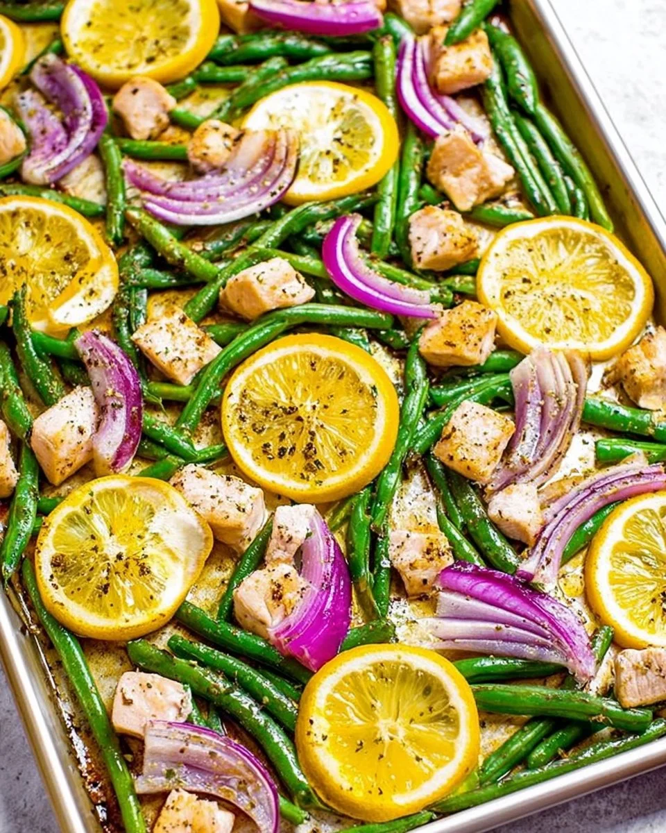 15-Minute Sheet Pan Lemon Pepper Chicken with fresh herbs and vegetables