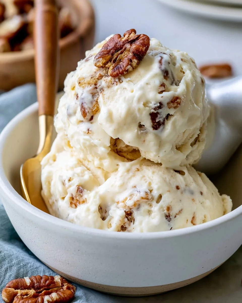 Delicious butter pecan ice cream with crunchy pecans in a bowl