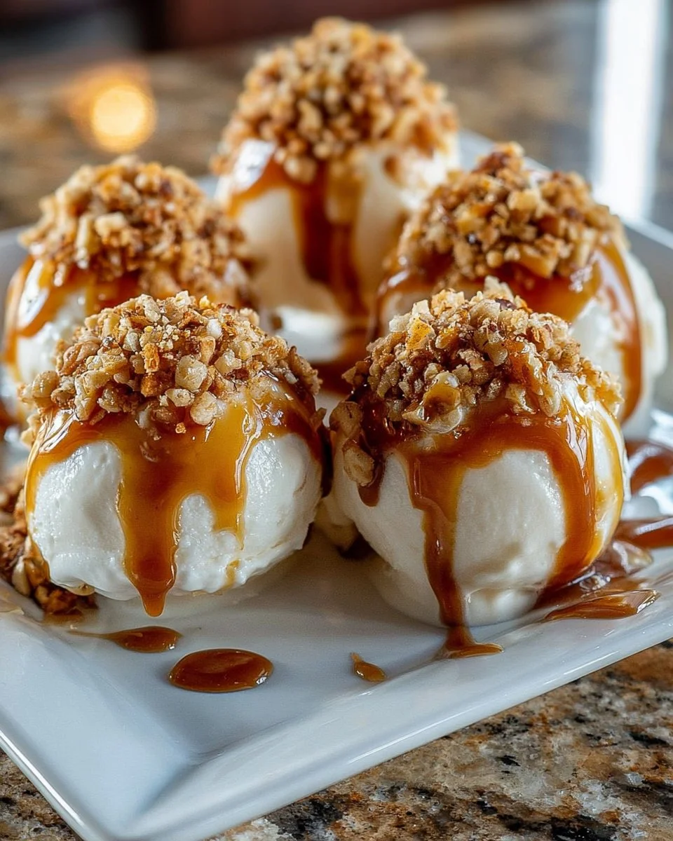 Delicious Caramel Crunch Cheesecake Bombs topped with caramel drizzle