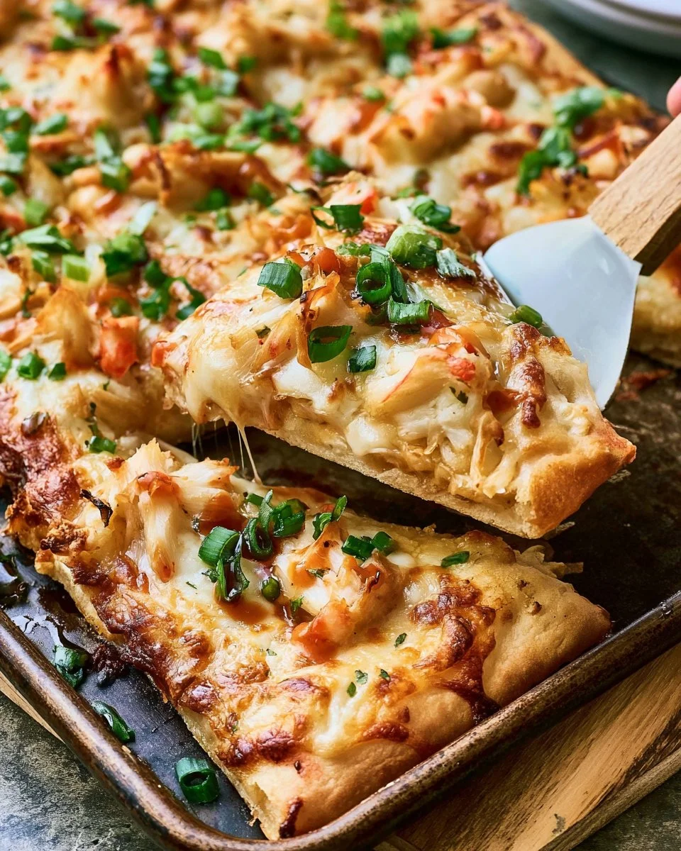 Crab Rangoon Pizza topped with creamy crab filling and crispy edges