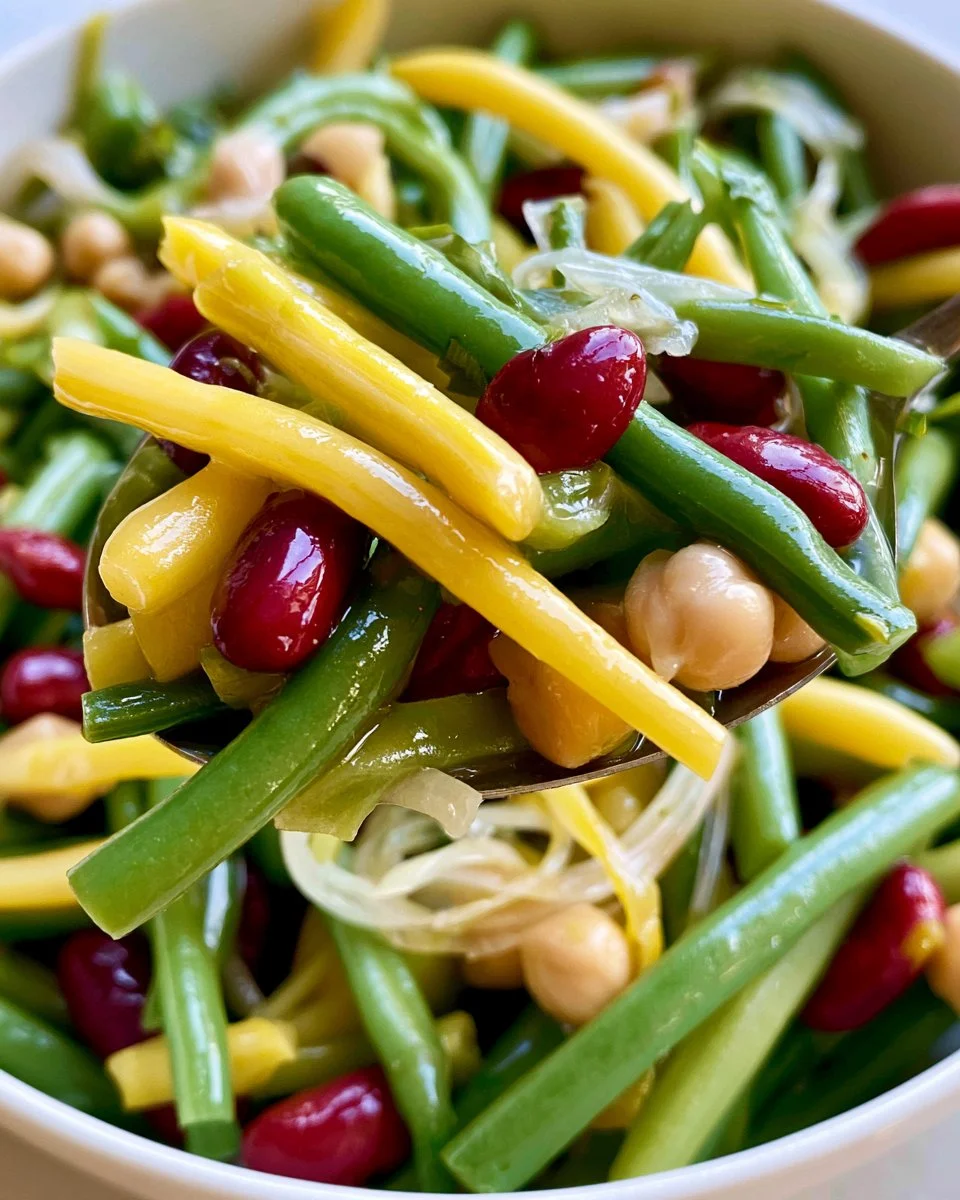 Colorful four bean salad with mixed beans and vegetables