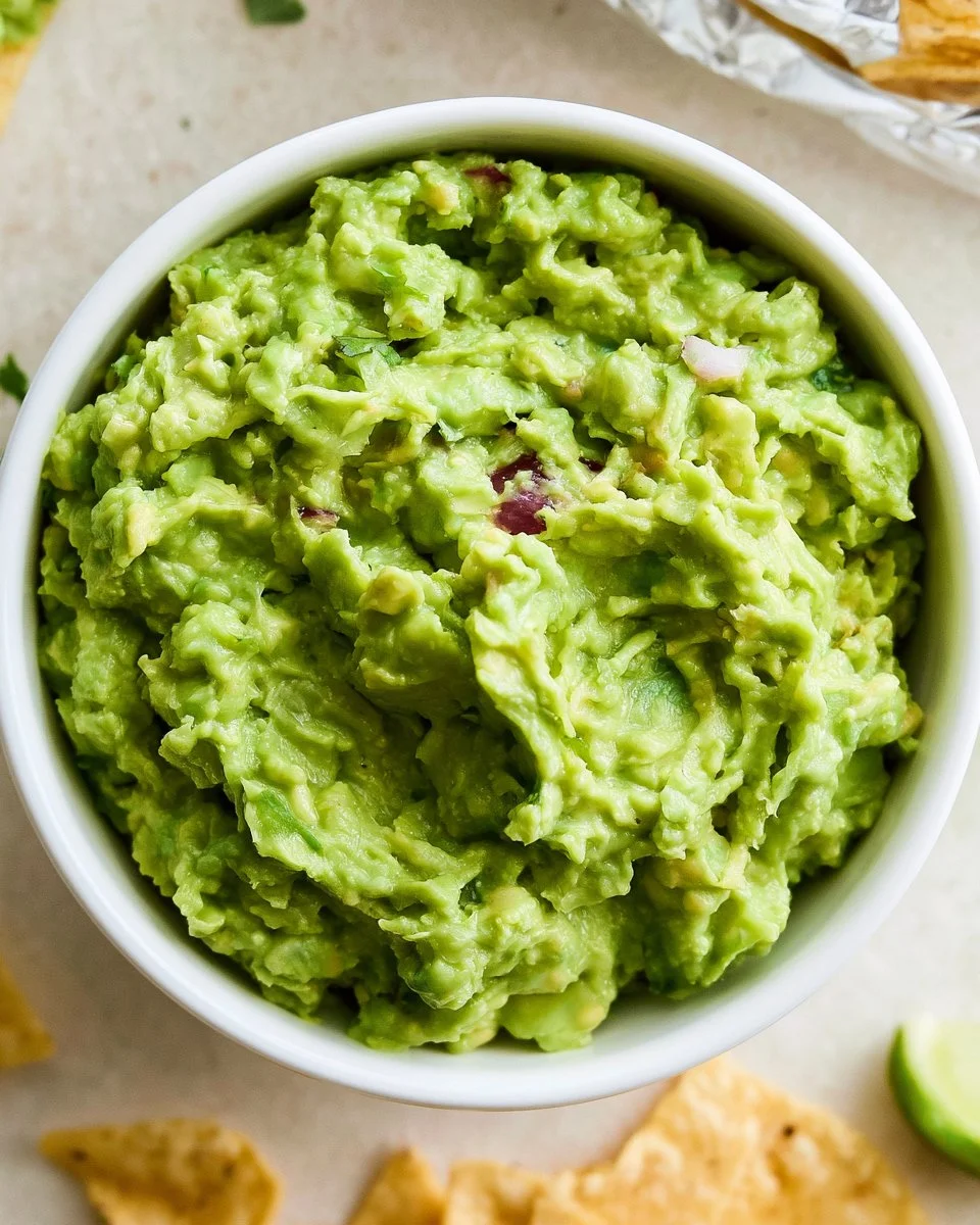 Bowl of homemade guacamole inspired by Chipotle recipe