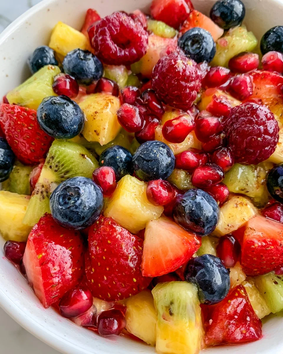 Bowl of fresh and zesty fruit salad with vibrant colors and textures