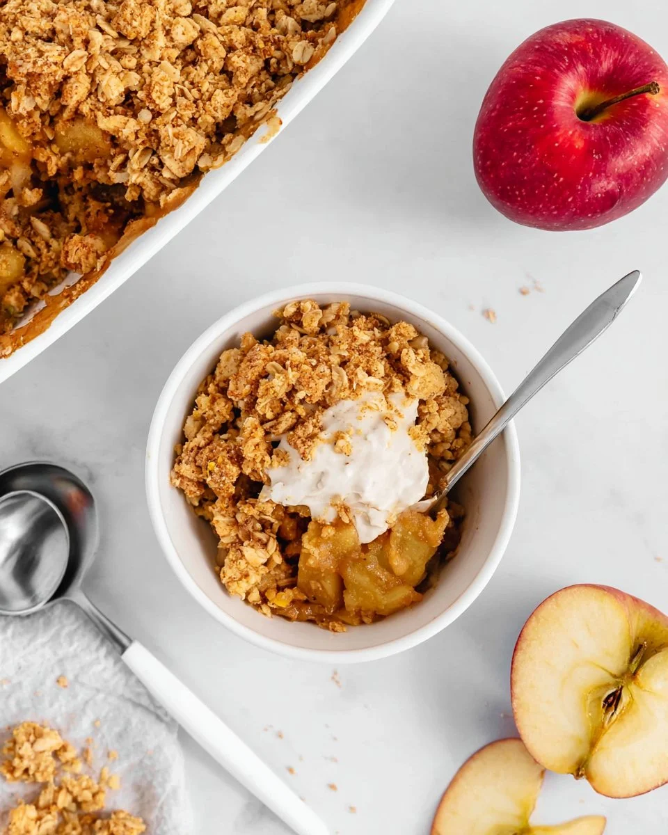 Delicious Vegan Apple Crisp topped with oats and cinnamon